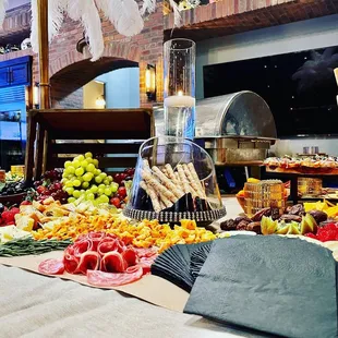 a variety of food displayed on a table