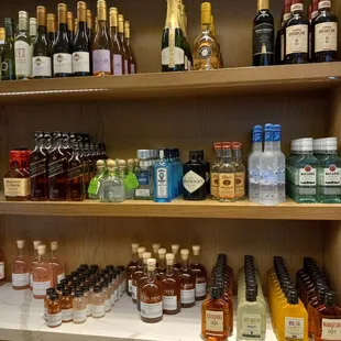 shelves of liquor and liquor bottles