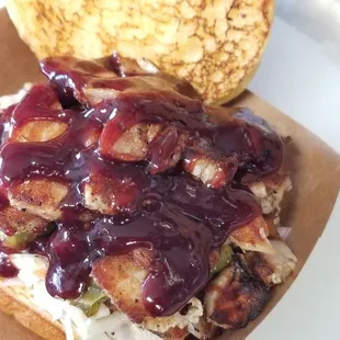 Pork Belly Sandwich with Crunchy Red Onion Slaw and Homemade Blueberry BBQ on a Toasted Brioche Bun