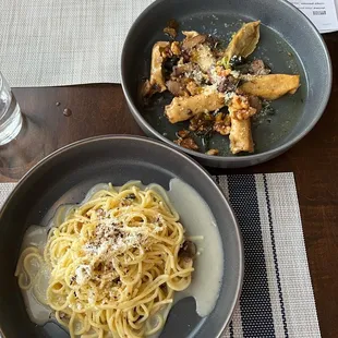 Wild mushroom agnolotii and cacio e pepe (truffle spaghetti)