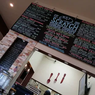 They have their entire menu on the wall, along with all the tasty beer they serve.