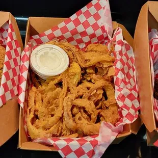 The spread ( from L to R) Plain, onion rings, lemon pepper, and maple butter bourbon  Taken 05.01.24
