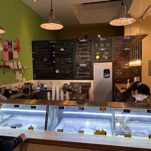 a man and a woman at a counter