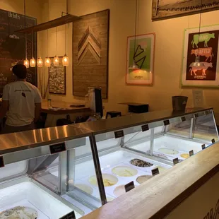 a counter with a variety of desserts