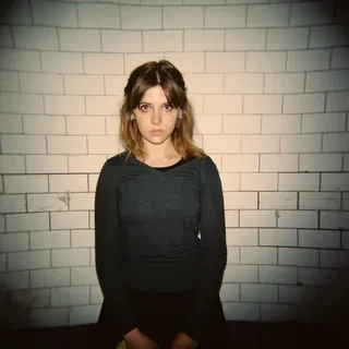 Laura L.