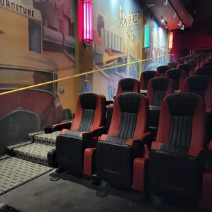 a row of seats in a movie theater