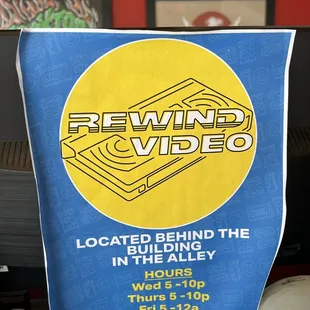 a poster for rewind video