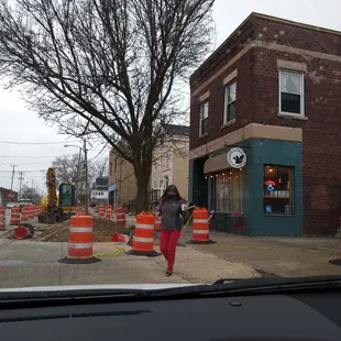 a woman walking down the street