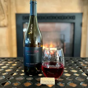 Cozy up to the fire in our Tasting Room Lounge and a bottle of our elegant Cinsault.