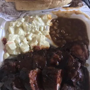 Brisket, rib tips, potato salad, and beans.