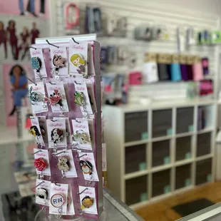 The small things can bring you the biggest smiles. Don't know what to get? Give the gift of a pretty badge reel or Gift Certificate.