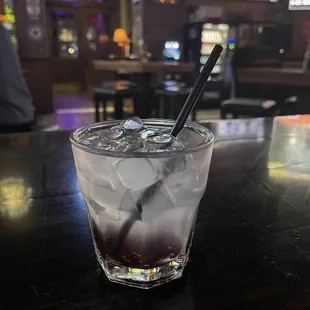 Vodka cranberry w/ bits of cherries at the bottom.