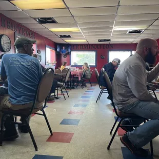 a man sitting at a table