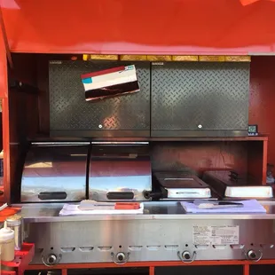 a kitchen in a red truck