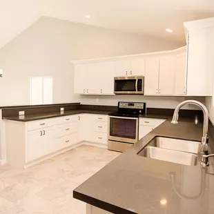 Quartz countertops, SCS tile!