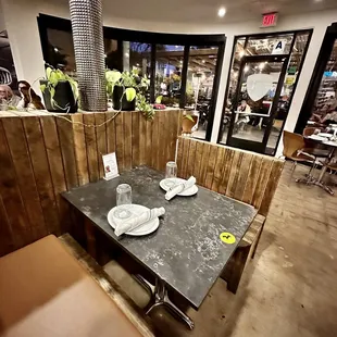 a table and chairs in a restaurant