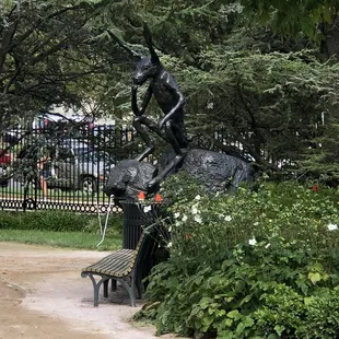 a statue of a man riding a horse