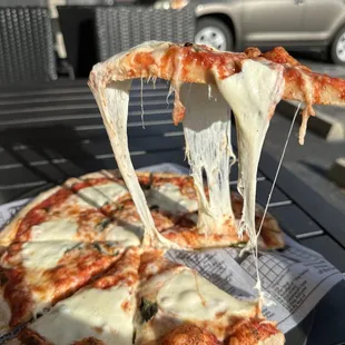 a beautiful cheese pull, how can you resist this!?