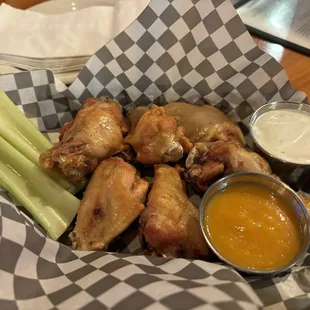 Naked wings with mango sauce on the side