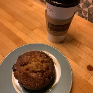 a cup of coffee and a muffin