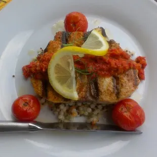 Blackened Wahoo on cous-cous with artechoke tapnade. Wahooo!