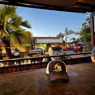 a man sitting at a table with a dog