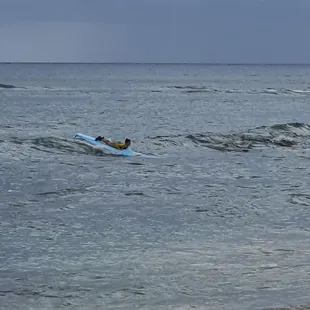 My 7-year-old son learning to surf for the first time
