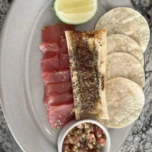 Bone marrow and some type of raw fish