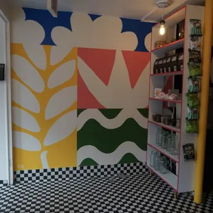 a kitchen with a checkered floor