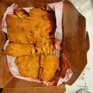 The fried catfish with fries.