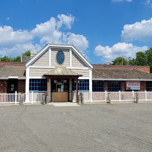 Storefront. Enter through the side door on the right side of the restaurant.