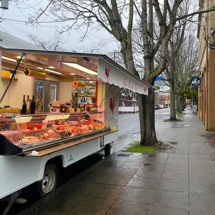 a food cart on a rainy day