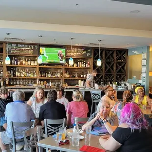 people eating and drinking