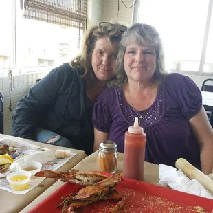 two women sitting at a table
