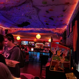 a group of people in a bar