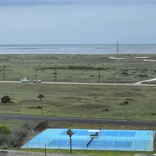 Tennis court/ basketball goals where the boys loved shooting hoops.
