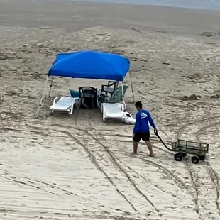 Closing time for the beach crew. About to break down the tents and chairs.