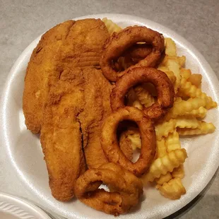 a plate of fried fish and french fries