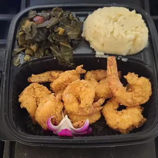 Fried shrimp, mash, collards.