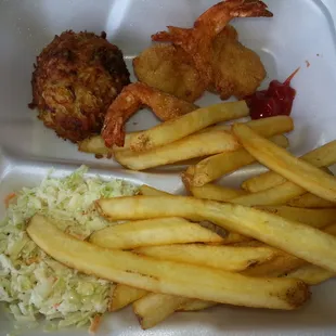 Crab Cake and Fried Shrimp Platter with coleslaw and fries.