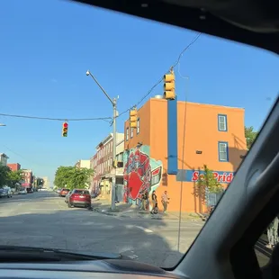 a view of the street from inside a car