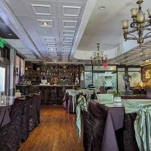 Indoor regular dining area with bar