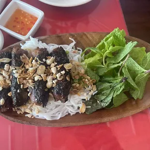 Grilled beef wrapped in Betel leaves