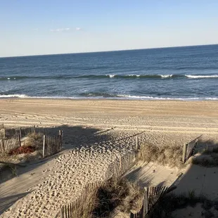 View from corner of balcony. That's the beach access immediately off the hotel.
