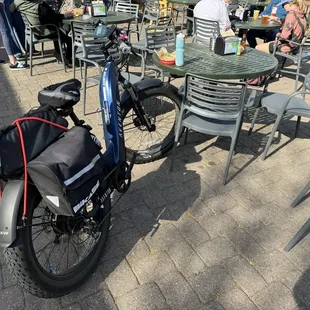 Me having my tacos with my bike ride at the table where I can be safe with it.