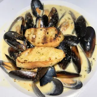 a plate of steamed mussels