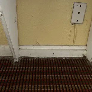 the small table near the beds