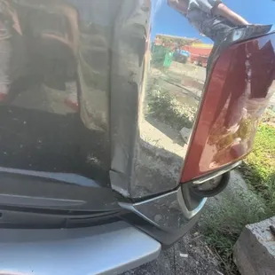 Someone backed into my car, hotel has no cameras or effective parking lights, and parking lot is chaotic and small.