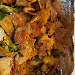 chicken and vegetables wrapped in foil