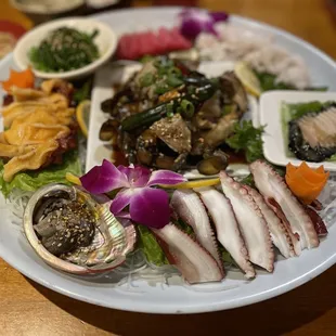 a plate of seafood and rice